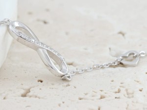 Bransoletka srebrna z nieskończonością i serduszkami próba 925    