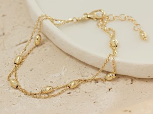 Bransoletka złota z ozdobami na dwóch łańcuszkach próba 585 